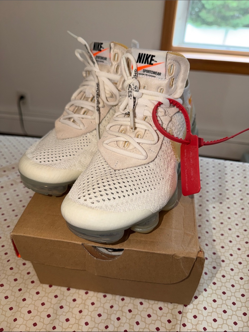 Off-White x Nike Cream White Sneakers with Red Zip Tie